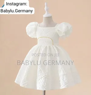 White Girl's Dress With Gold Pattern
