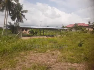 Land With Building for Sale at Adeiso Area.