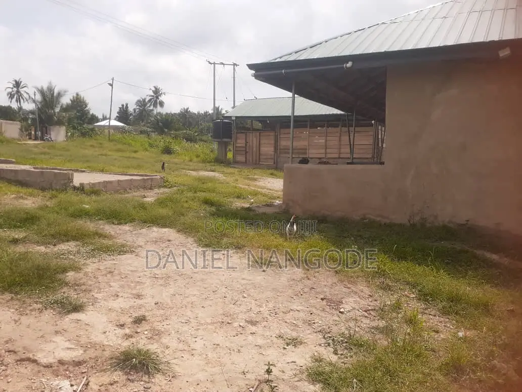 Land With Building for Sale at Adeiso Area.