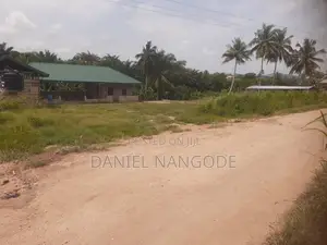 Land With Building for Sale at Adeiso Area.