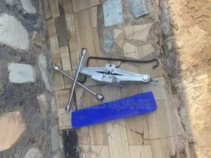 Car Jack , Warning Triangle and Wheel Spanner