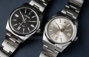 Rolex Oyster Perpetual Watch Red Dial.