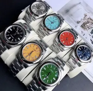 Rolex Oyster Perpetual Watch Red Dial.