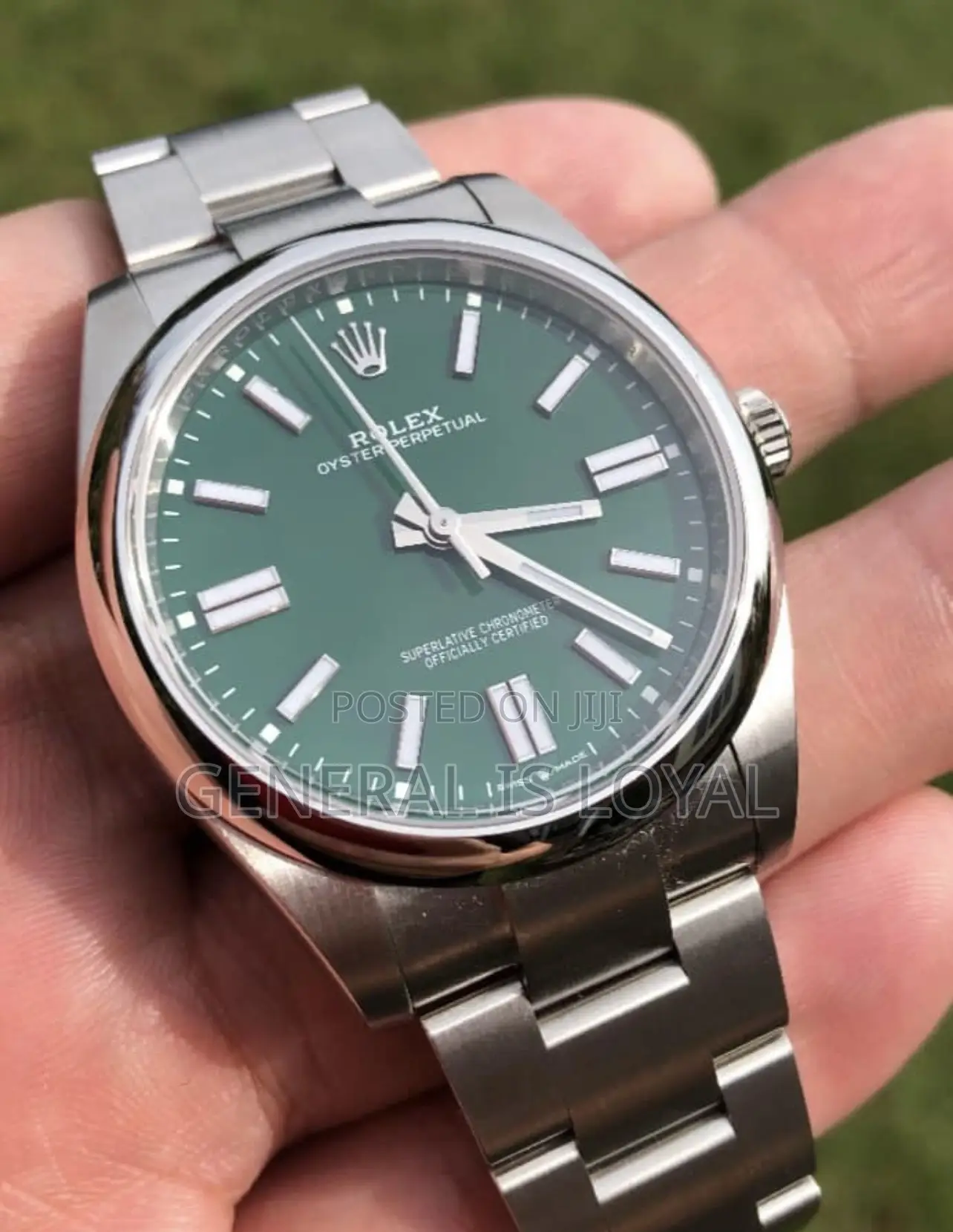 Rolex Oyster Perpetual Watch Red Dial.