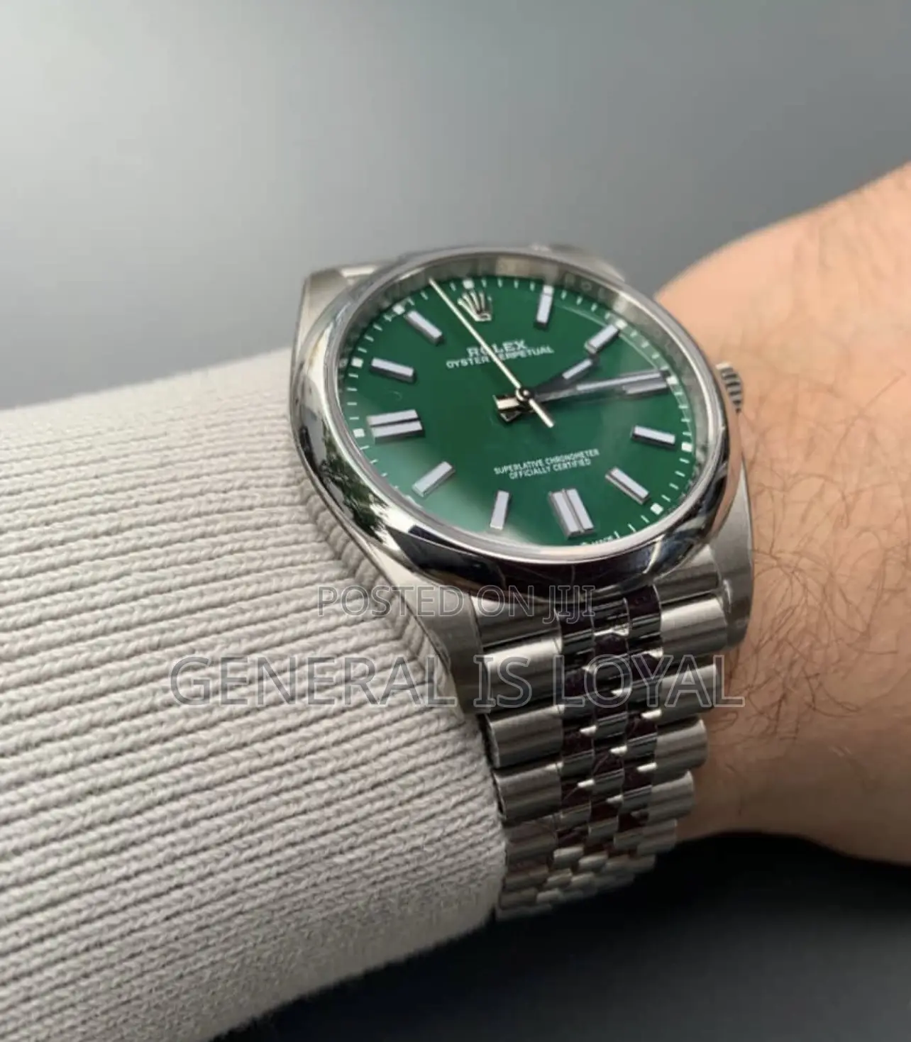 Rolex Oyster Perpetual Watch Red Dial.