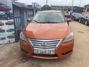 Photo - Nissan Sentra SV 4dr Sedan (1.8L 4cyl CVT) 2015 Orange