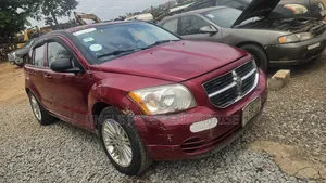 Photo - Dodge Caliber 1.8 L SXT 2009 Red