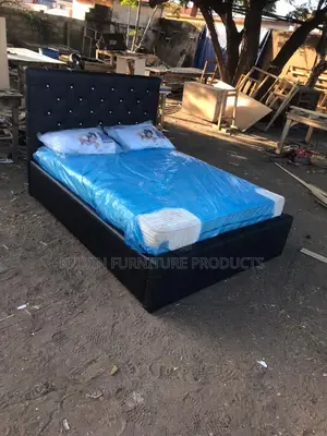 Double Bed With Mattress and Pillows