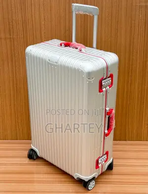 Rimowa Two Toned Silver Red Handle Travel Suitcase