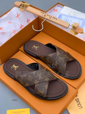 Louis Vuitton Monogram Cross-Strap Slides.