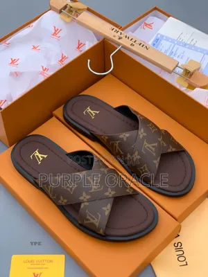 Louis Vuitton Monogram Cross-Strap Slides.