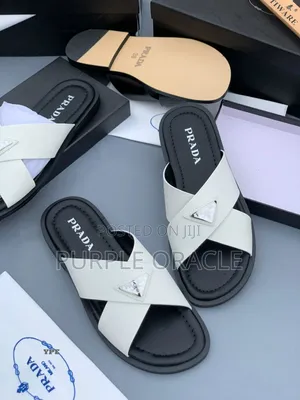 Prada White and Bkack Cross-Strap Slides.