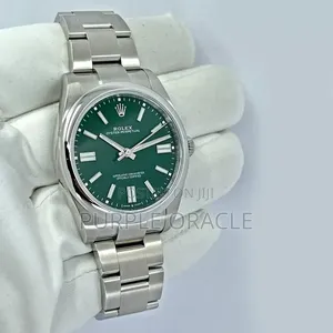 Rolex Oyster Pepertual Green Dial Watch