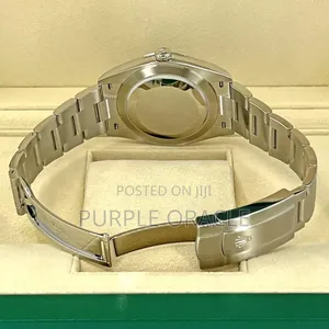 Rolex Oyster Pepertual Green Dial Watch