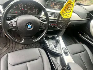 BMW 320i Sedan RWD 2015 Black