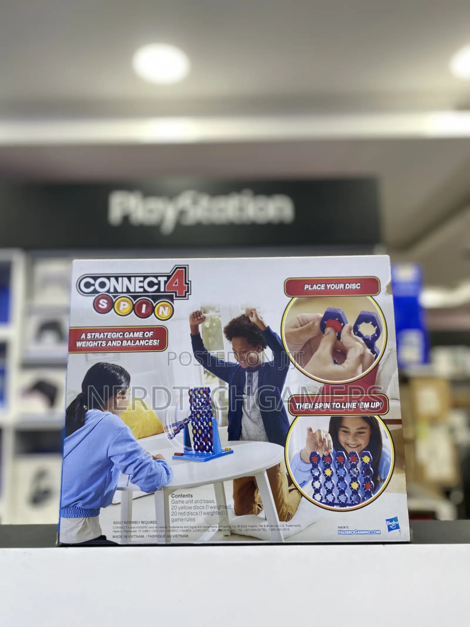 Hasbro Gaming Connect 4 Spin Game, Features Spinning