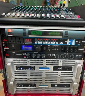 Full Set of Amplifiers in Rack With Mixer Cabling