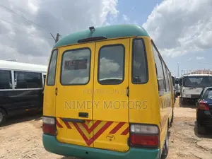 Toyota Coaster 2014 Yellow
