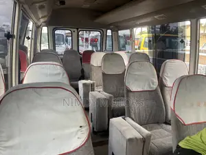 Toyota Coaster 2014 Yellow