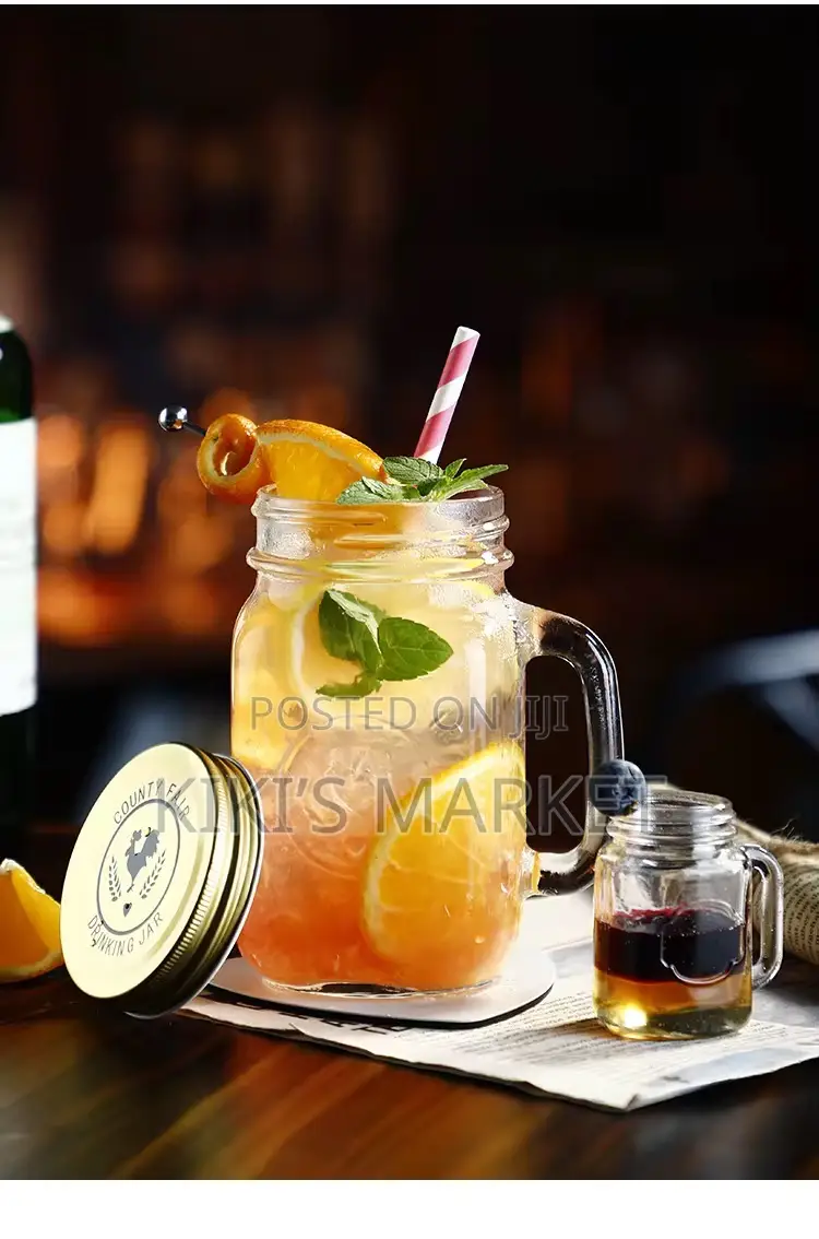 Mason Jar With Colored Lida and Straw