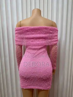 Bodycon Mini Dress With an Off-Shoulder Neckline and Long Sleeves.