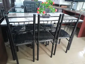 Rhodues Dining Table and Chairs