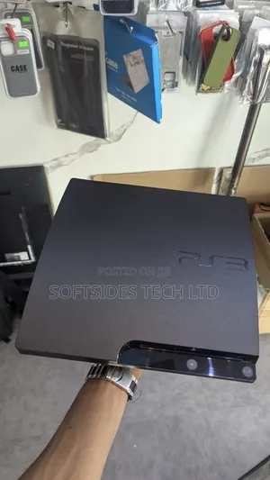 A Black Playstation 3 Slim With Games for Sale in Accra