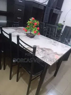 Rhodues Dining Table and Chairs