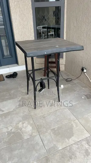 1 Used Solid Table Wood and Metal Legs for Sale