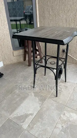 1 Used Solid Table Wood and Metal Legs for Sale
