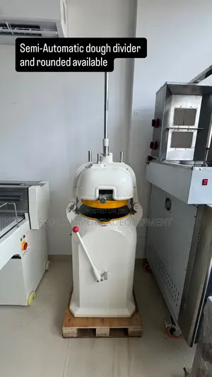 Semi-autonomic Dough Divider And Rounder