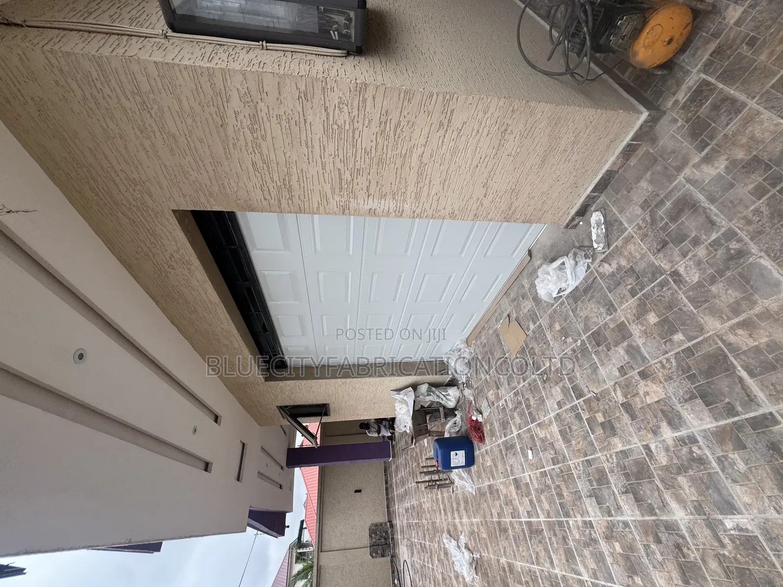 Garage Door With Extended Fanlight