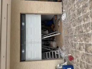 Garage Door With Extended Fanlight