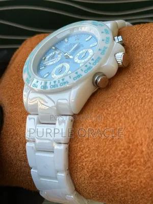 Blue Dial Yet All White Ceramic Rolex Daytona Timepiece
