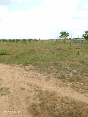 2 And Half Plot Spintex Main Road