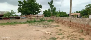 2 And Half Plot Spintex Main Road