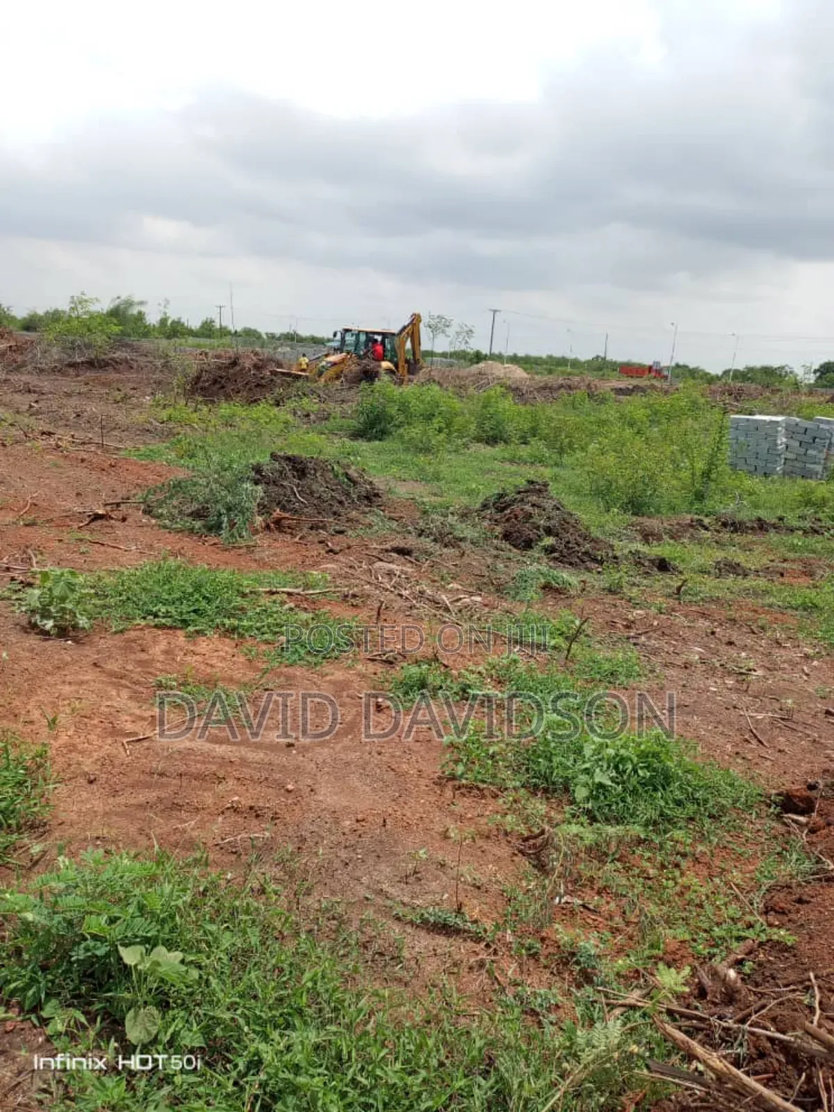 2 And Half Plot Spintex Main Road