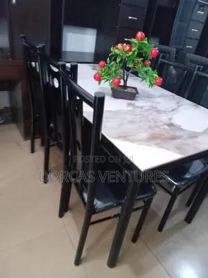 A Polished Glass Dining Set
