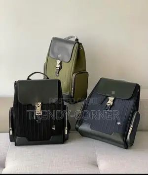 Leather-Trimmed Canvas Backpacks
