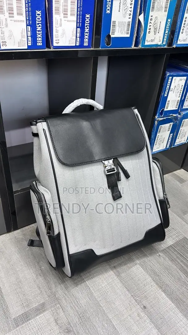 Leather-Trimmed Canvas Backpacks