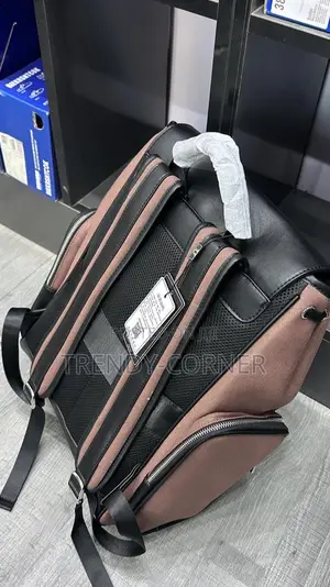 Leather-Trimmed Canvas Backpacks