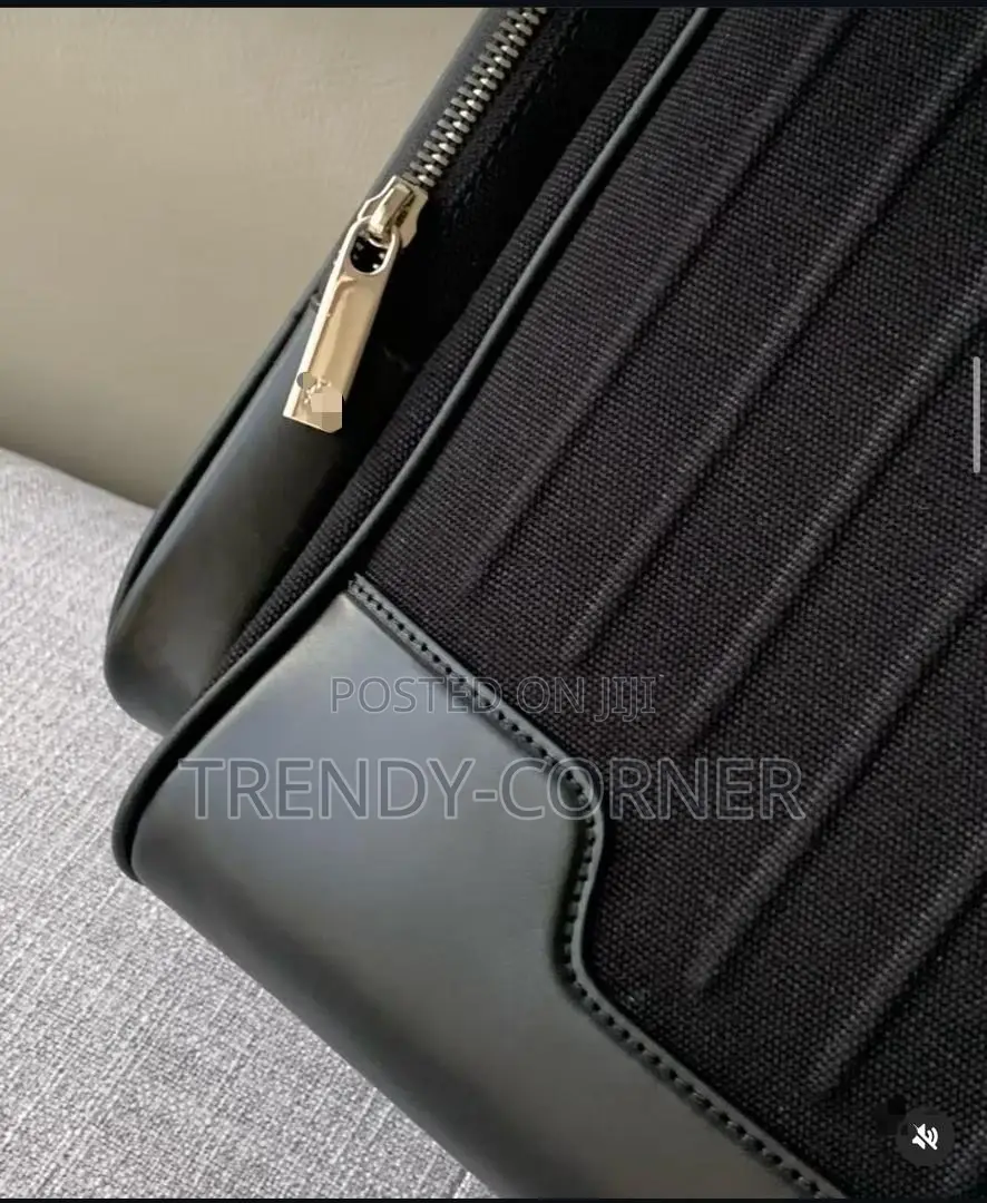 Leather-Trimmed Canvas Backpacks