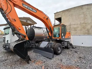 Brand New Develon Backhoes and Excavators With Terms of Payment