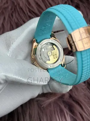 Patek Philippe Aquanaut Rose Gold Tiffany Blue Dial Strap Moonphase
