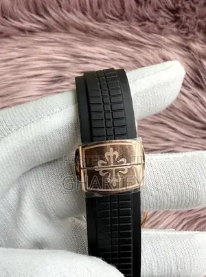 Patek Philippe Aquanaut Rose Gold With Black Dial Strap – Moonphase