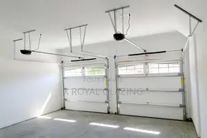 White Modern Remote Control Garage Door Well Installed