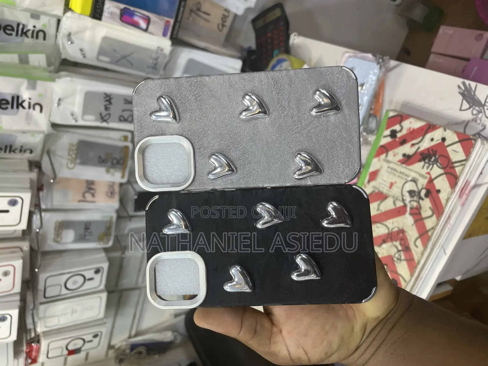 iPhone Case With a Textured Grey Finish and Several Silver