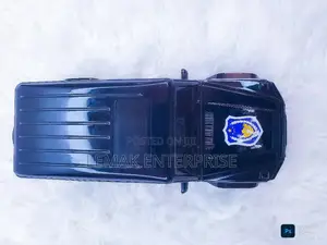 A Black Toy Police Suv For Kids