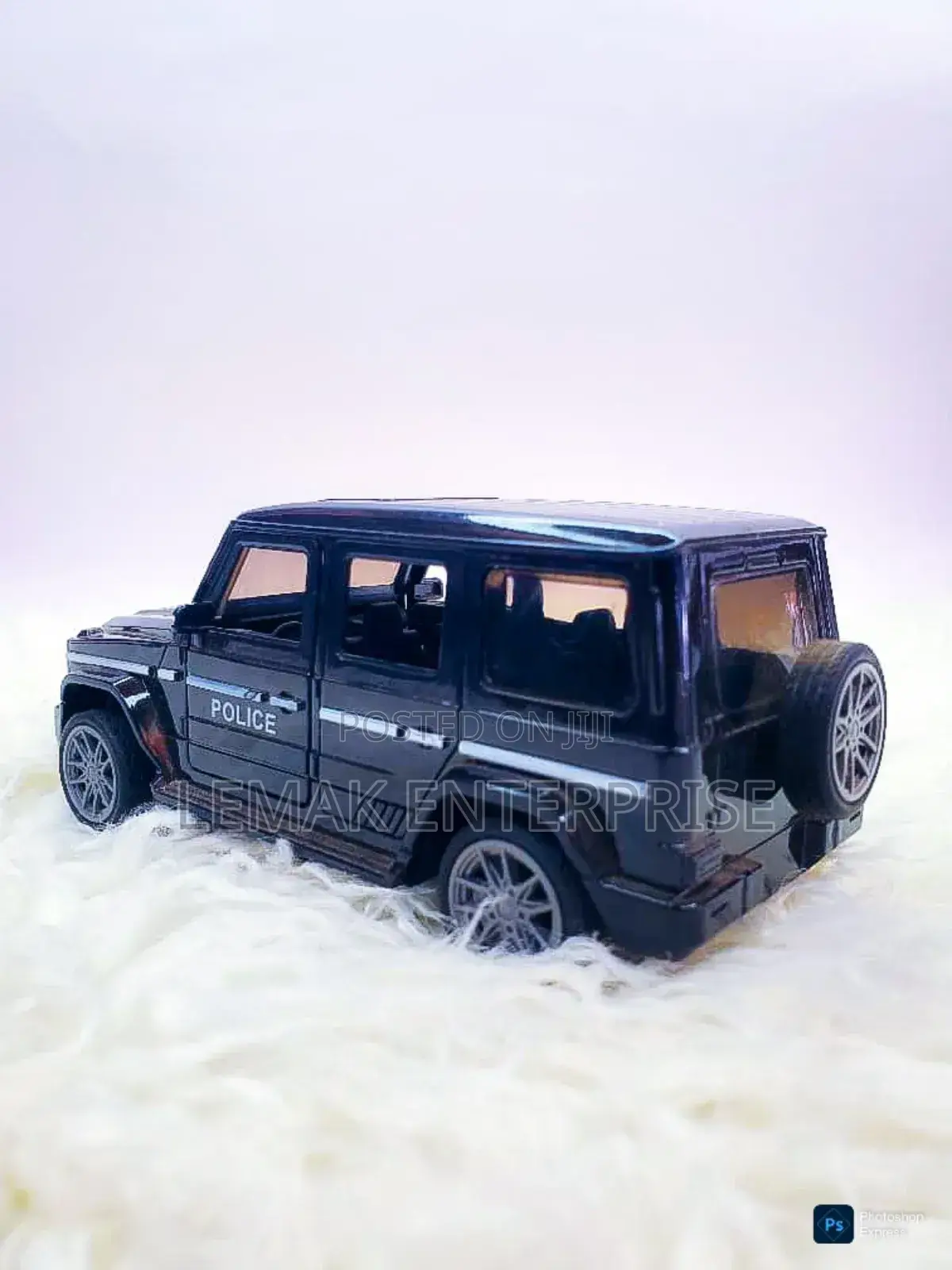 A Black Toy Police Suv For Kids
