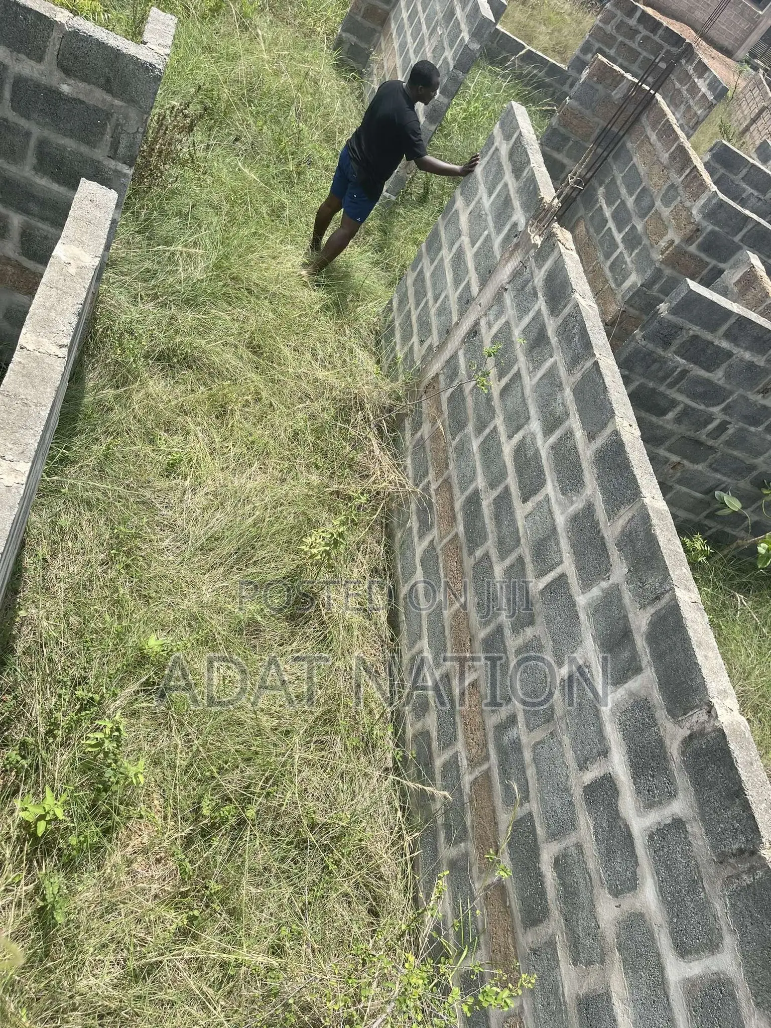 Uncompleted Structure on a 72 by 99 Plot of Land